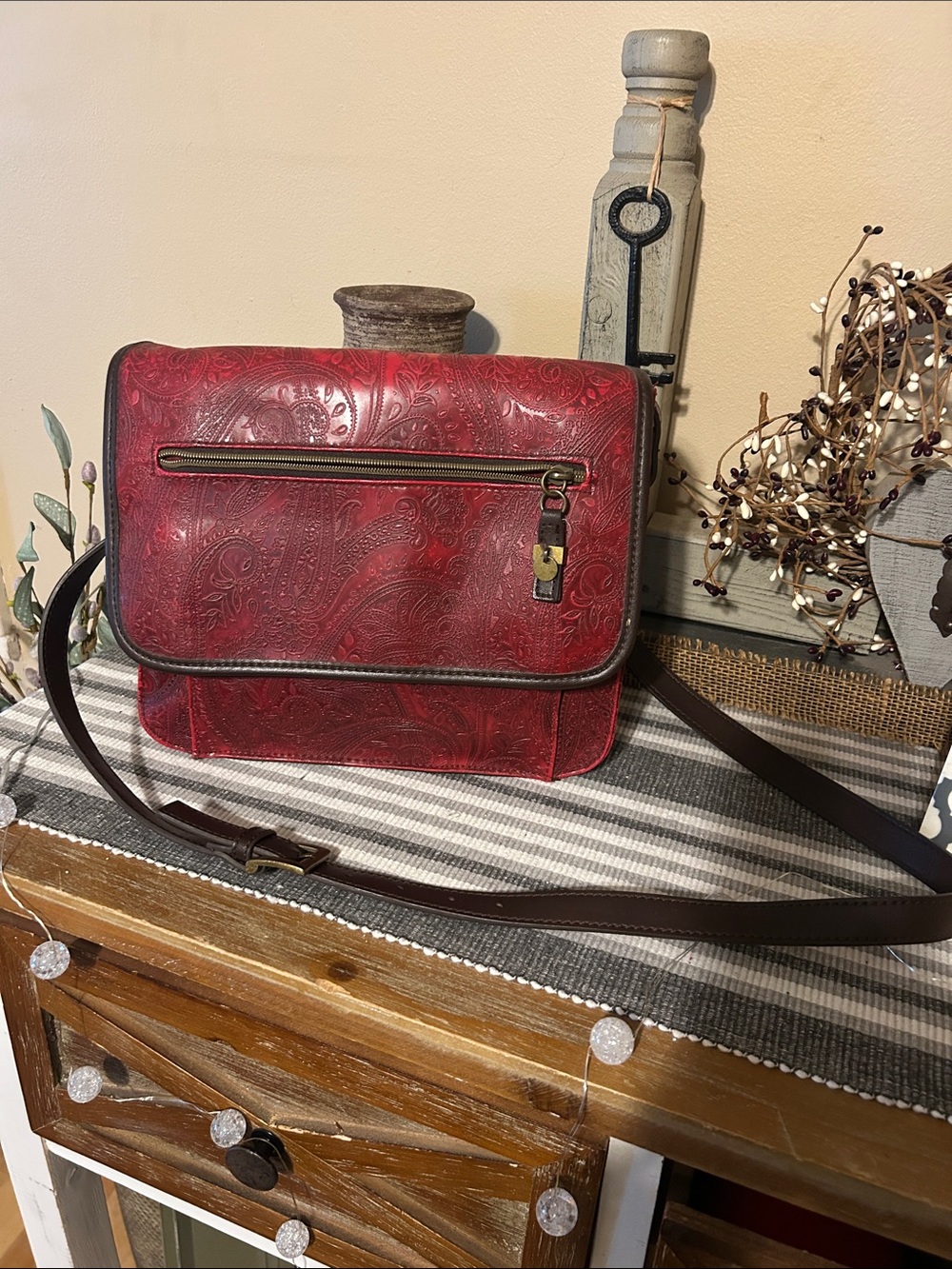 Relic Red Embossed Crossbody Bag with Dark Brown Strap
